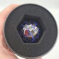 Kość metalowa D100 Voidcaster — Zdjęcie promo (z ręki)
