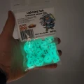 Kości DCC Lightning Bolt (zestaw 14 szt.) — Zdjęcie promo (z ręki)