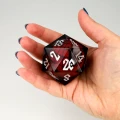 Kość żywiczna D20 50 mm Spidey (liquid core) — zawartość (producent)