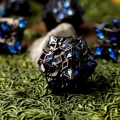 Kości metalowe Obsidian Alloy (zestaw 7 szt.) — zawartość (producent)