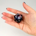 Kość żywiczna D20 33 mm Tempest Tesserae (floating eye) — zawartość (producent)